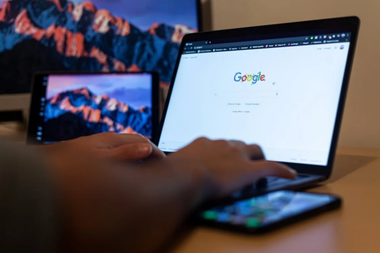 A person using a Google browser on a laptop