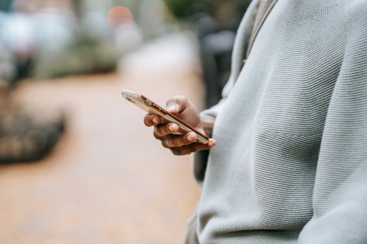 A woman holding a mobile phone