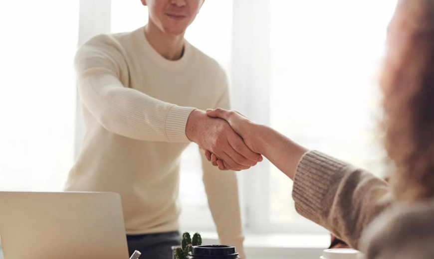 Two people shaking hands