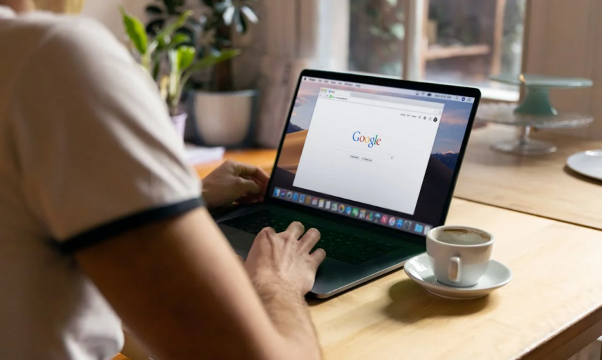 A person using a Google browser on their laptop