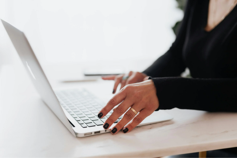 A woman working on a laptop